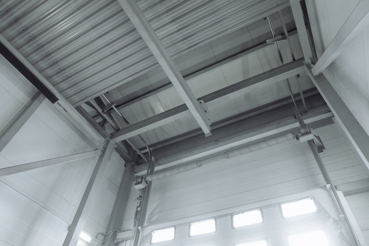 Overhead door tracks and mechanism